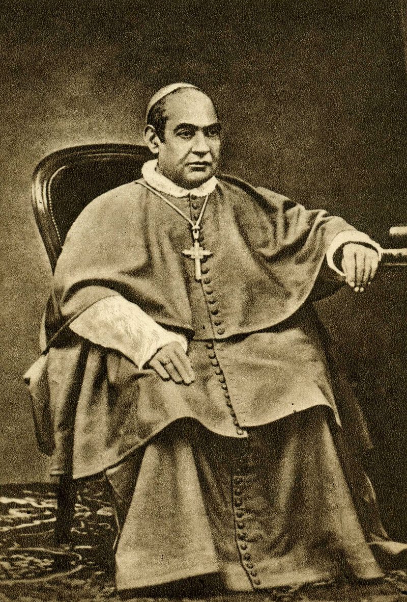 Old photograph of St. Anthony Mary Claret seated in an archbishop’s cassock with a pectoral cross.