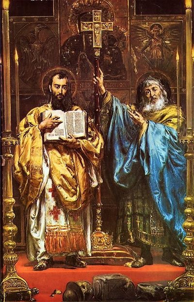 Painting of Sts. Cyril and Methodius standing together, one holding an open book, beneath a cross.