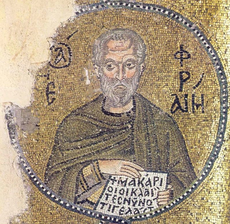 Mosaic of St. Ephrem, gray-bearded, holding a scroll with Greek writing.