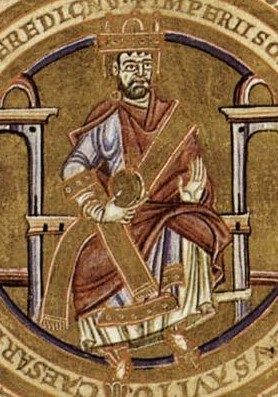 Medieval image of St. Henry enthroned as emperor, wearing a crown, inside a circle of lettering.