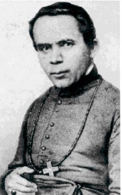 Black-and-white portrait of St. John Neumann in a cassock with a pectoral cross.