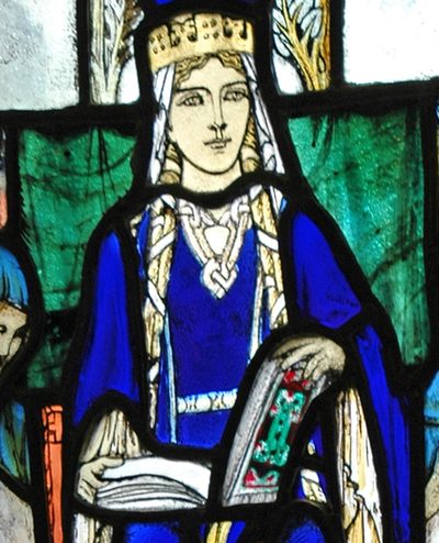Stained-glass window of St. Margaret of Scotland, crowned, holding a book.