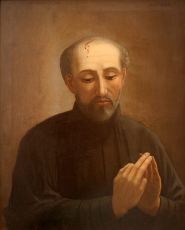 Painting of St. Isaac Jogues, a Jesuit priest, praying with folded hands.