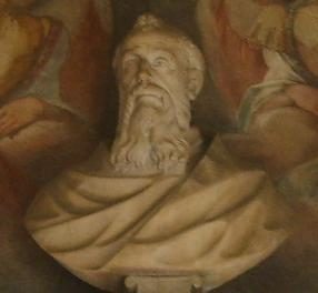 Carved stone bust of St. Peter Damian, bearded.